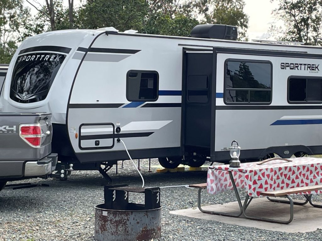 sporttrek travel trailer at a campground