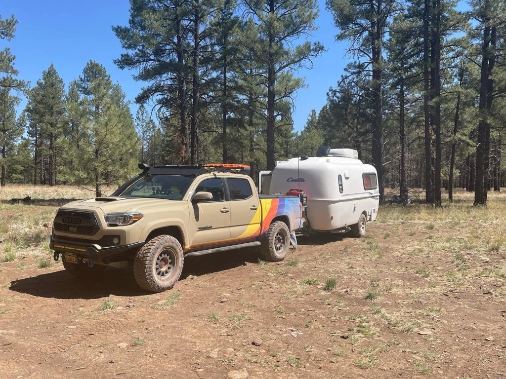 A Casita trailer camps in National Forest near Flagstaff