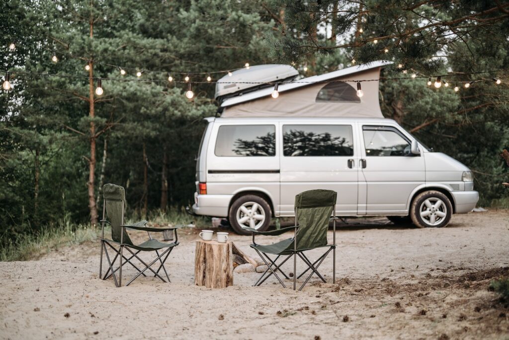 van camper set up in the sand