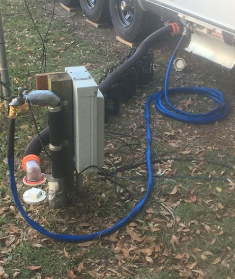 rv hooked up to a heated water hose