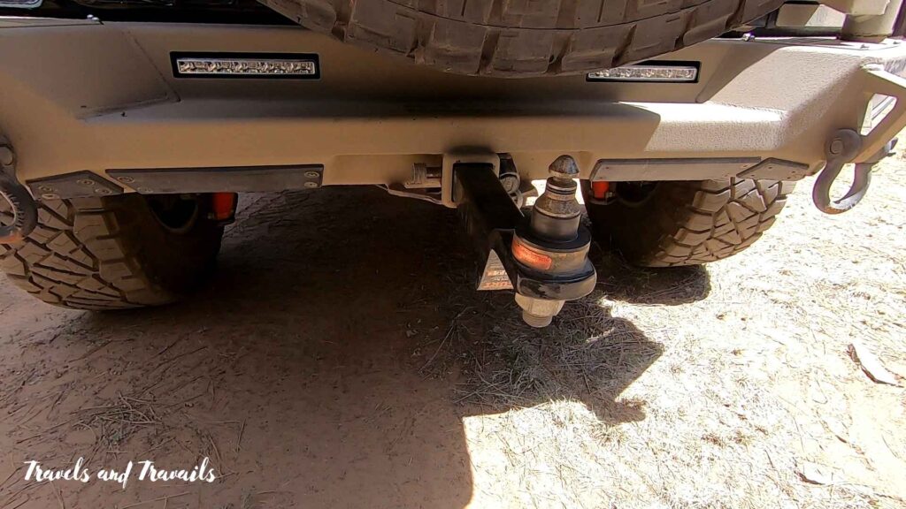Off-road trailer hitch coupler