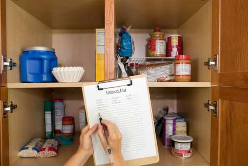inside pantry cupboard with checklist